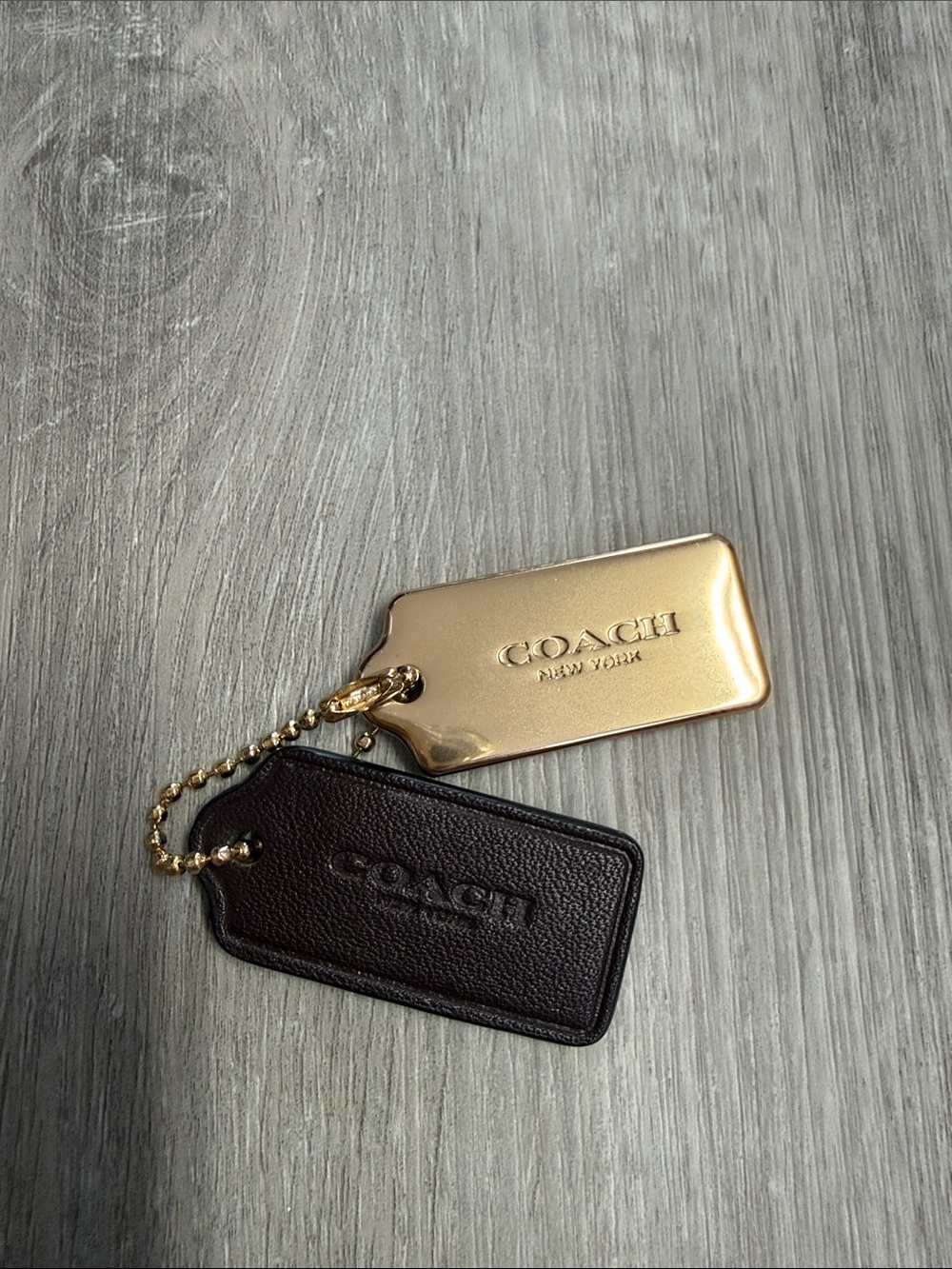 Coach Brown Leather Key Tag with Gold Metal Logo Plate